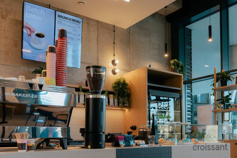 a kitchen with a table in a room