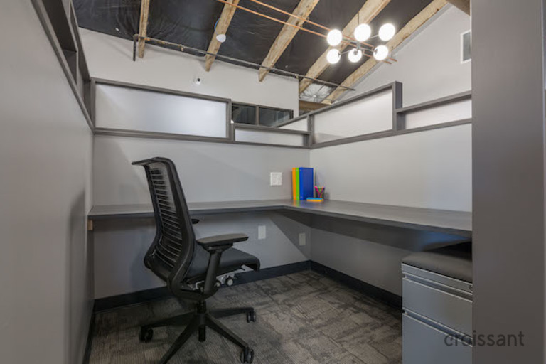 a kitchen with a sink and a window