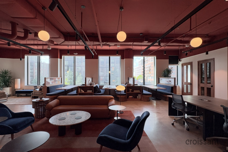 a room filled with furniture and a large window