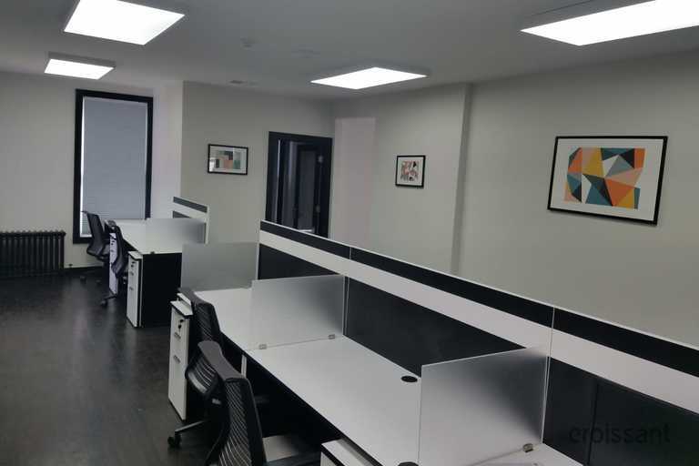 a room filled with furniture and a flat screen tv