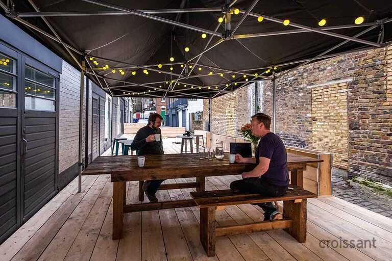 a man sitting on a bench