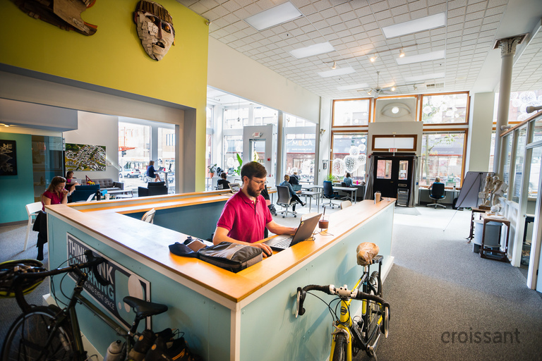 a couple of people that are standing in the kitchen