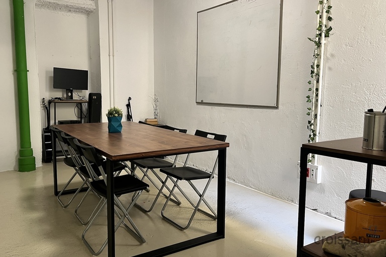 a room with a table and chairs