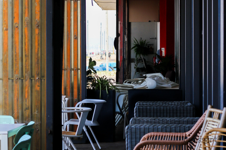 a chair sitting in front of a building