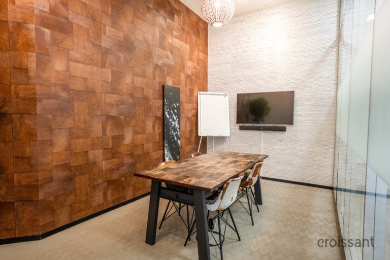 a living room with a wooden floor