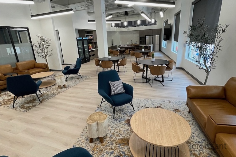 a living room filled with furniture and a fire place