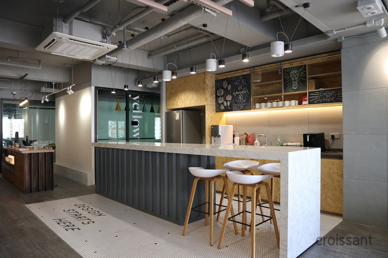 a kitchen with a dining room table