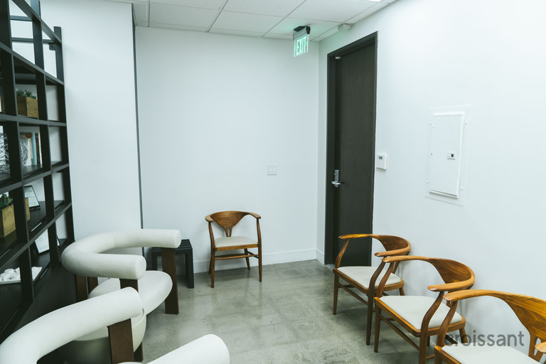 a room filled with furniture and a table