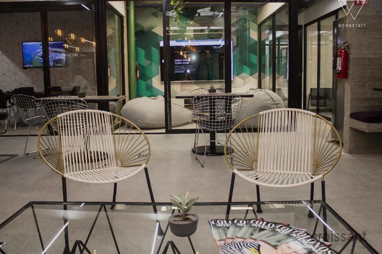 a chair sitting in front of a restaurant