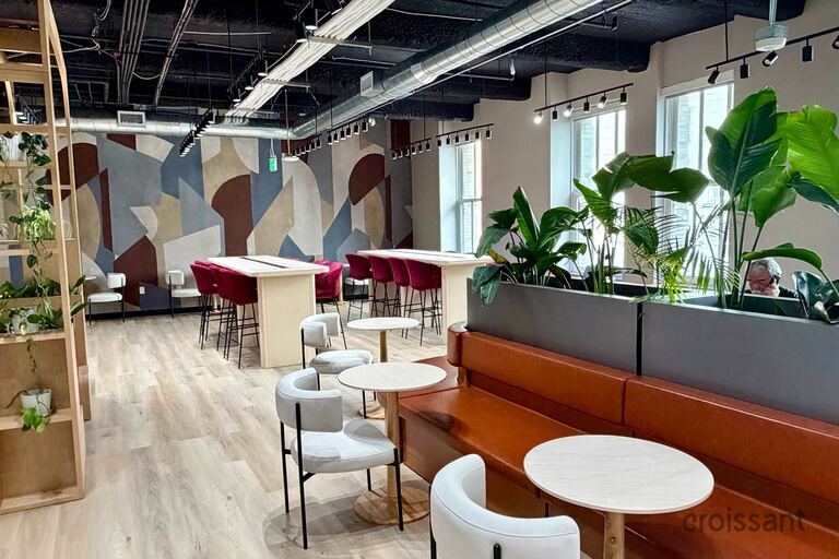 a room with tables and chairs