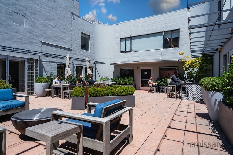 a bench in front of a building