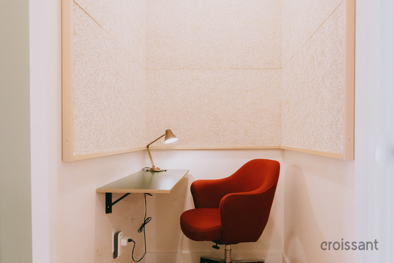 a room with a sink and a mirror
