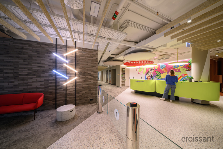 a group of people standing in a room