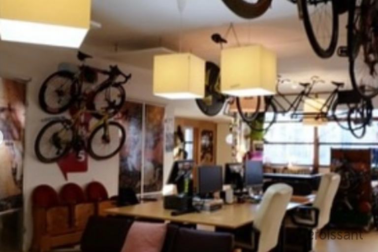 a living room filled with furniture and a table