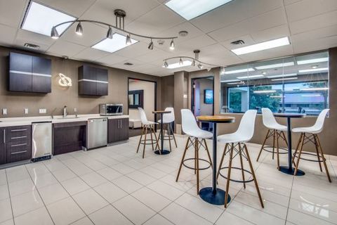 a kitchen with a tile floor
