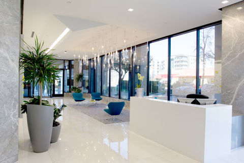 a room filled with furniture and a large window