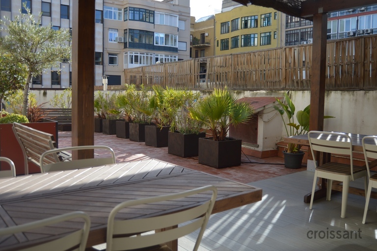 a dining room table in front of a building