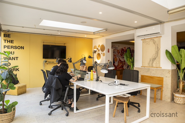 a room filled with furniture and a fireplace