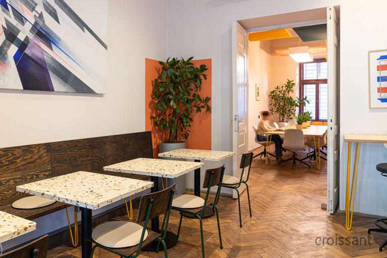 a room with tables and chairs