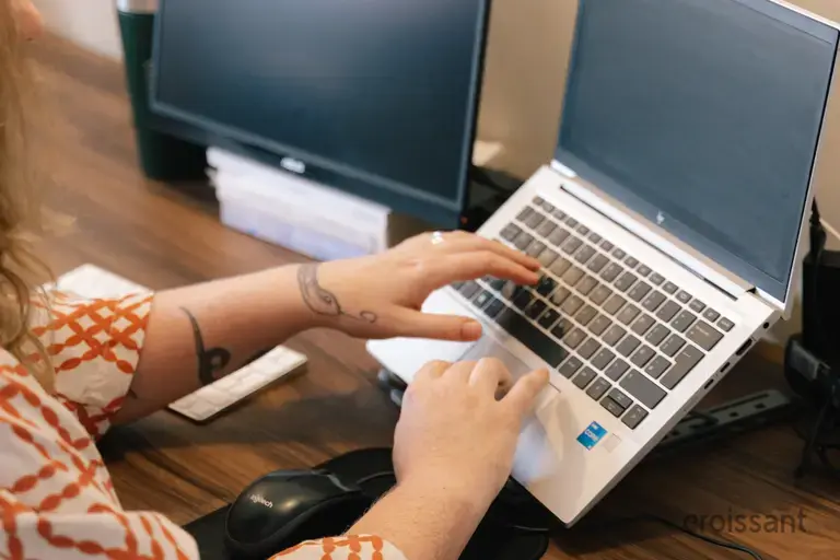 a woman using a laptop