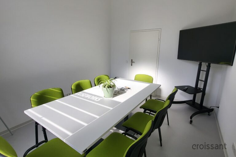 a green chair in a room